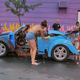 Illustration for article titled Noir Leather Bikini Car Wash Meetup Pictures